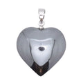 A polished Hematite heart-shaped pendant with a reflective metallic finish and a bail at the top, shown on a plain white background.