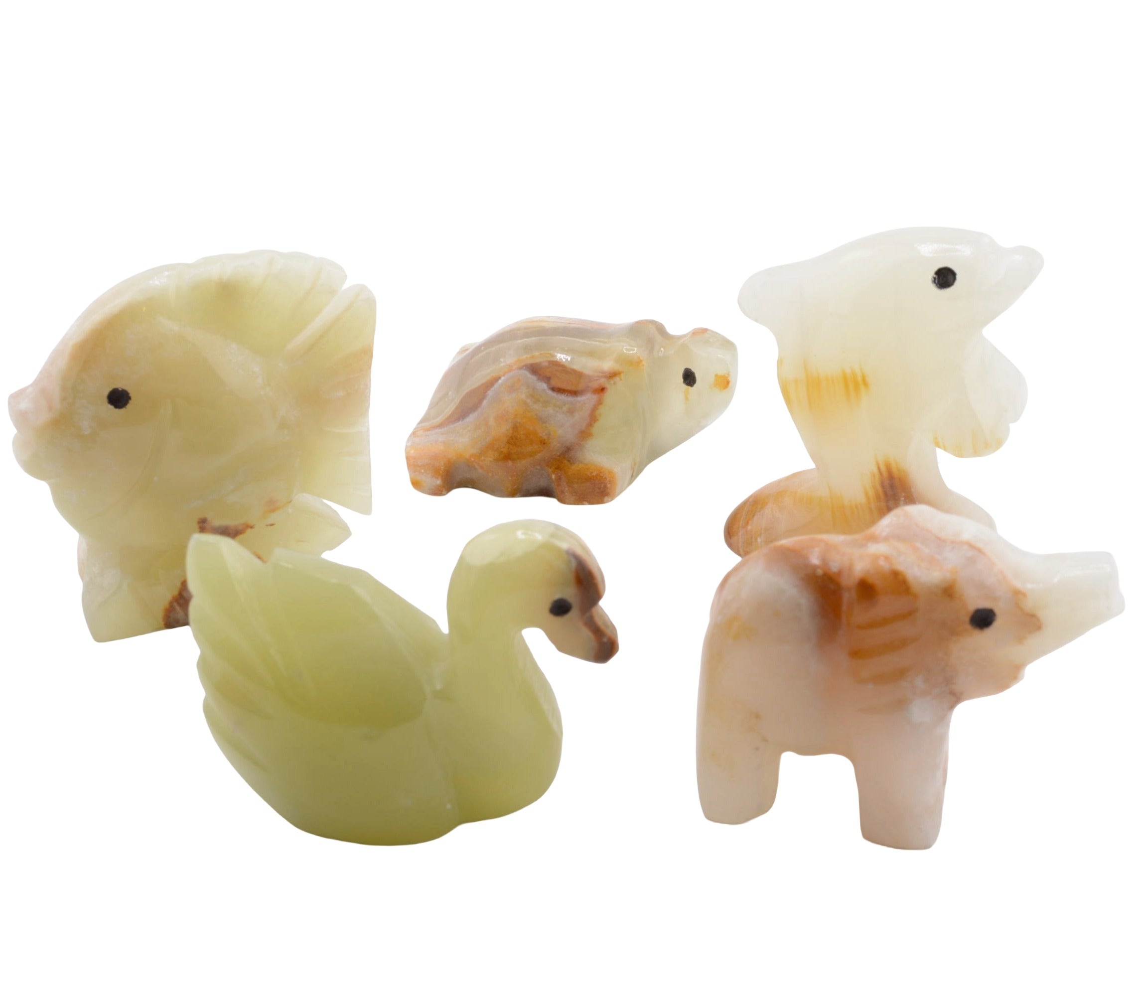 Five small carved animal figurines made from banded calcite stone, including a fish, turtle, duck, elephant, and dolphin, shown on a plain white background.